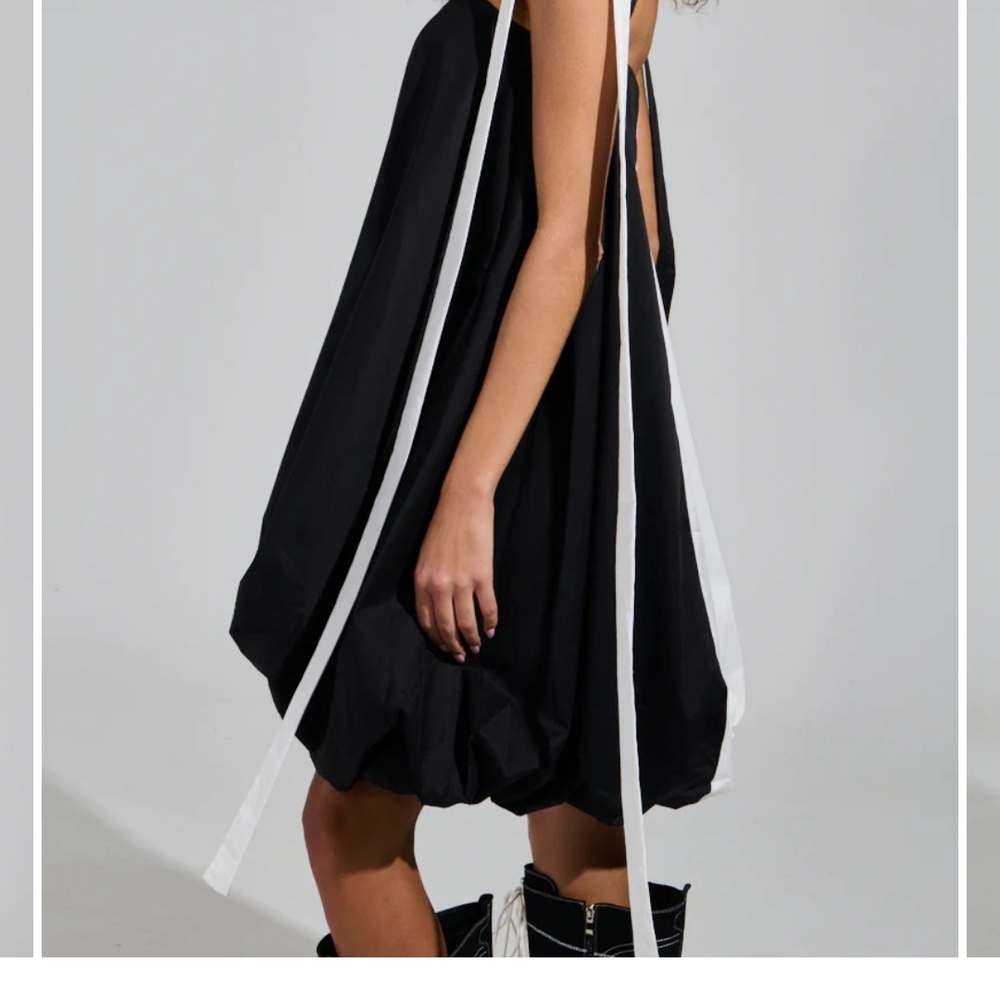 Chic Black Dress with White Accents